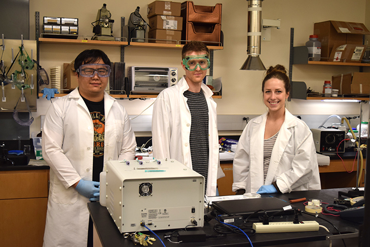 Green River College engineering students participate in a lab developing solar cells.