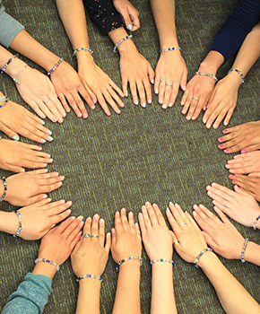 A circle of hands. 2015 SUSI participants.