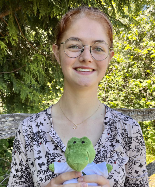 Suzanne Jonkers, Gap Year student holds Gator, the GRC Mascot