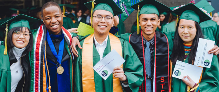 2022 Green River College International student graduates outside Kent Showare Center