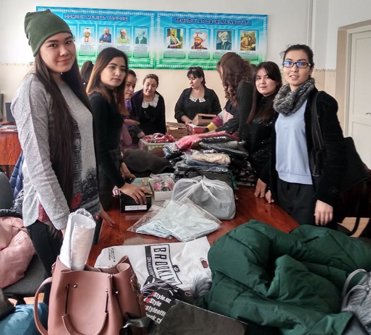 Gavhar and volunteers sorting donations.