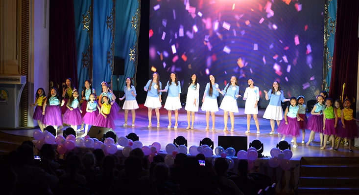 Performers on stage at the fundraising concert.