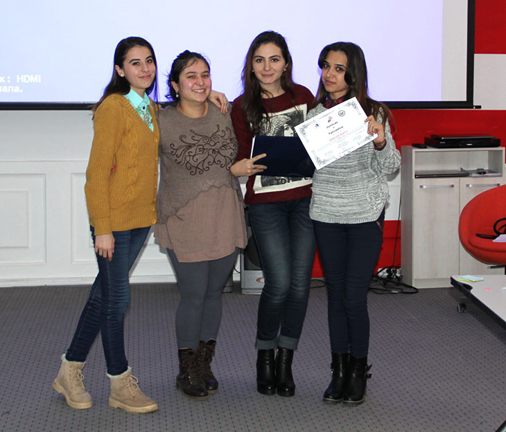 Photo of SUSI alumni Nigina, Takhmina, Zarrina plus guest speaker after implementing a two-day workshop in the capital city of Dushanbe called “Women's Voice.”