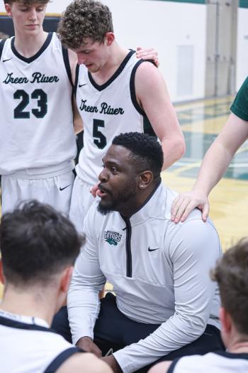 Godfrey Drake, GRC's mens basketball head coach, and players