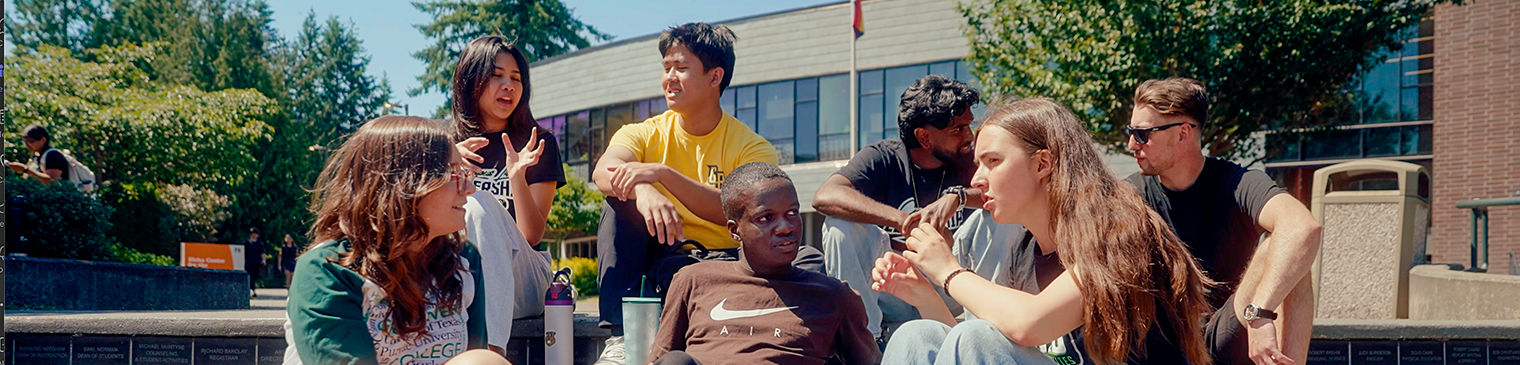 Green River College students siting outside
